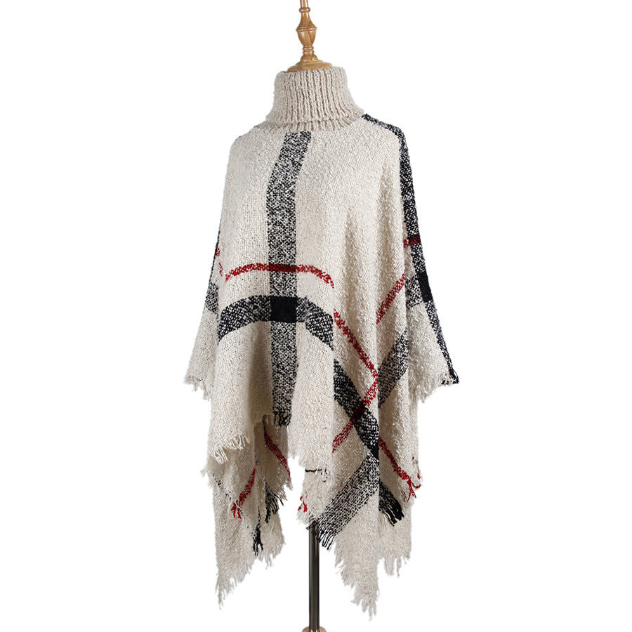Knit Sweater with Turtleneck and Fringe Cape Design